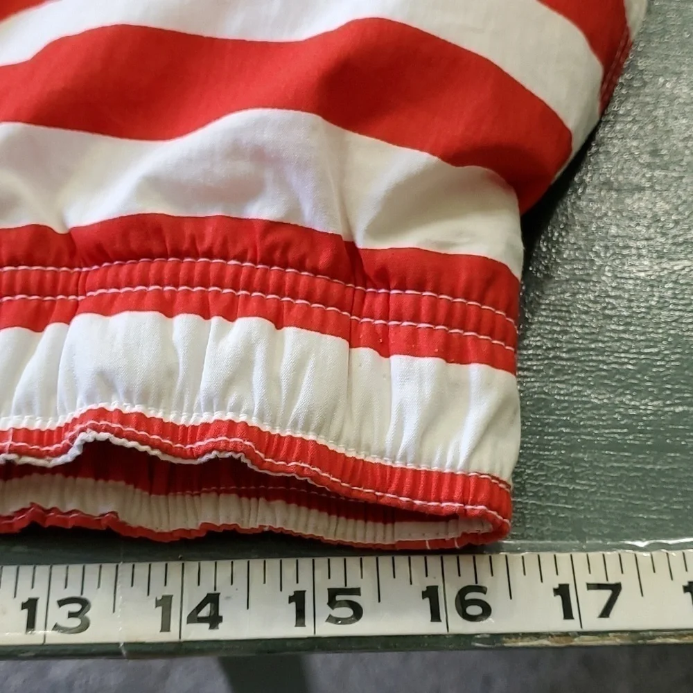 TACKLE & TIDES, AMERICAN FLAG BATHING SUIT.‎  SIZE large. Net linned.